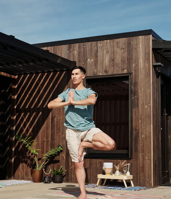 Person in a balanced pose showing focus and stability.